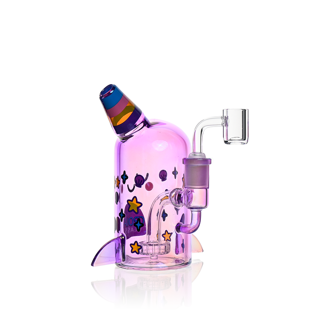 Close-up of the rainbow striped spiral horn mouthpiece on a Croia Glass iridescent pink narwhal bubbler.