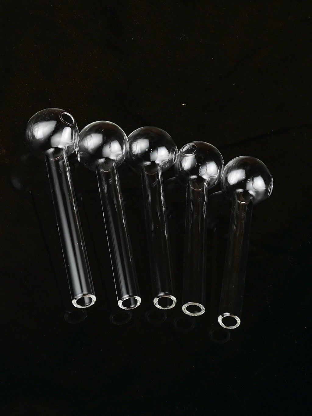 Set of 10 Croia Glass 4-inch oil burner pipes in various colors, showcasing their sleek design and craftsmanship.